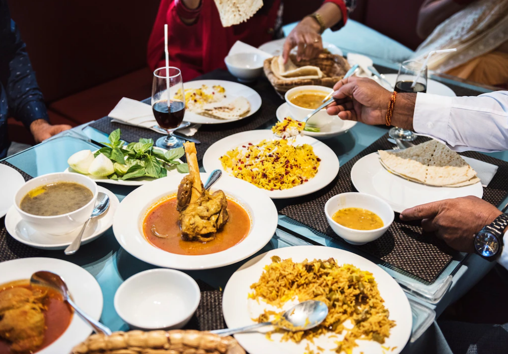 people eating Kashmiri food