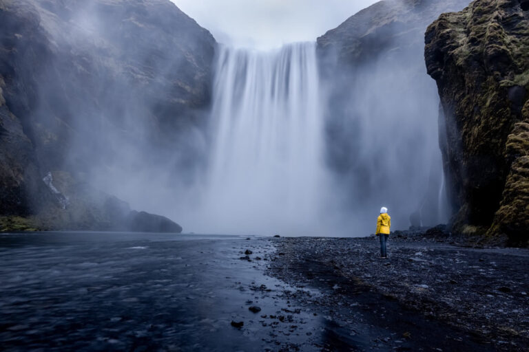 Lady visiting waterfalls during monsoon